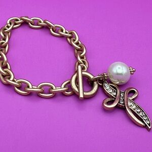 Gold tone chain charm bracelet